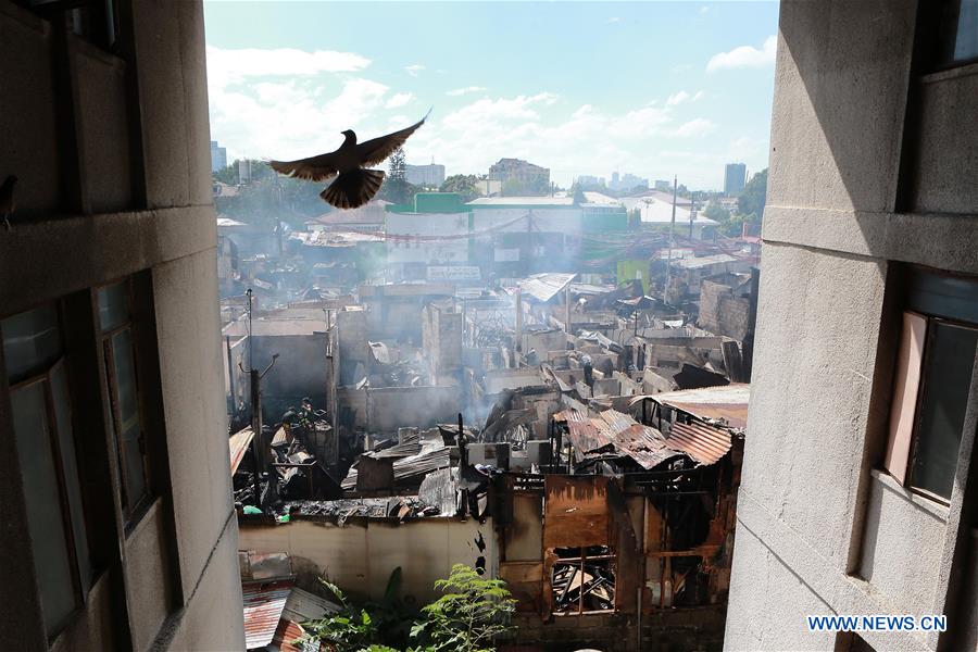 PHILIPPINES-QUEZON CITY-SLUM AREA-FIRE