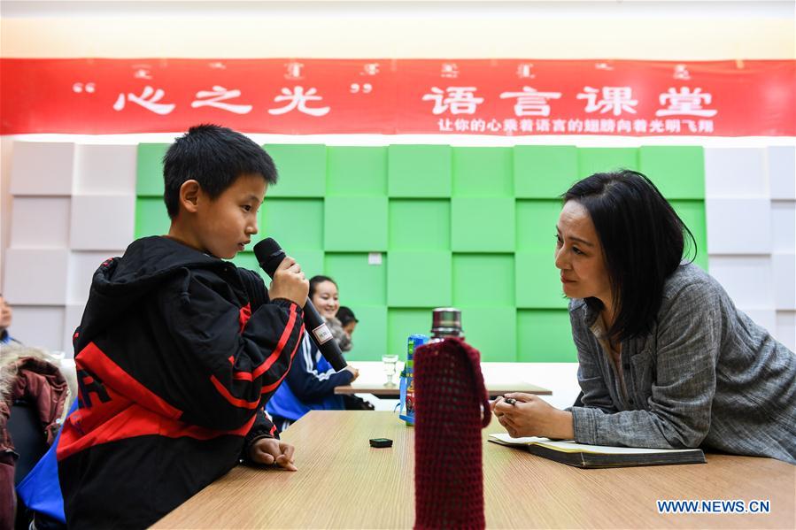 CHINA-INNER MONGOLIA-HOHHOT-VISUALLY IMPAIRED-CINEMA-POEM-VOLUNTEER (CN)