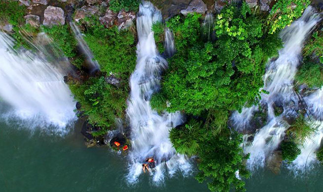 Tourists enjoy themselves in Liuzhou, south China's Guangxi