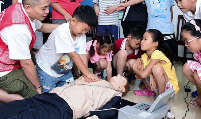 Volunteer center in Cixi City opens science courses for pupils during summer