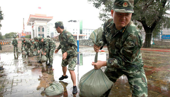 Heavy rain displaces thousands in NE China after Typhoon