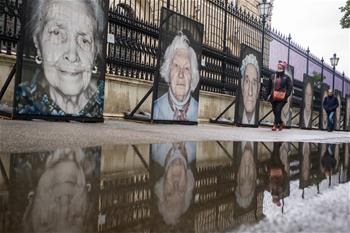 Photo portraits of holocaust survivors in WWII shown in Vienna, Austria